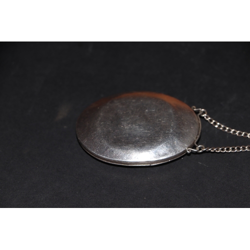 397 - A Victorian silver and moonstone locket on chain, marks rubbed and indistinct, 33g.