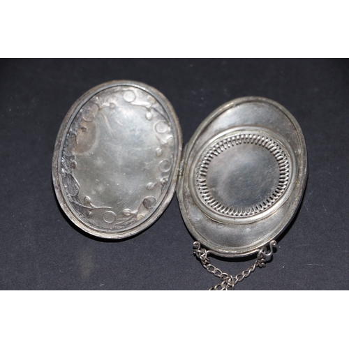 397 - A Victorian silver and moonstone locket on chain, marks rubbed and indistinct, 33g.