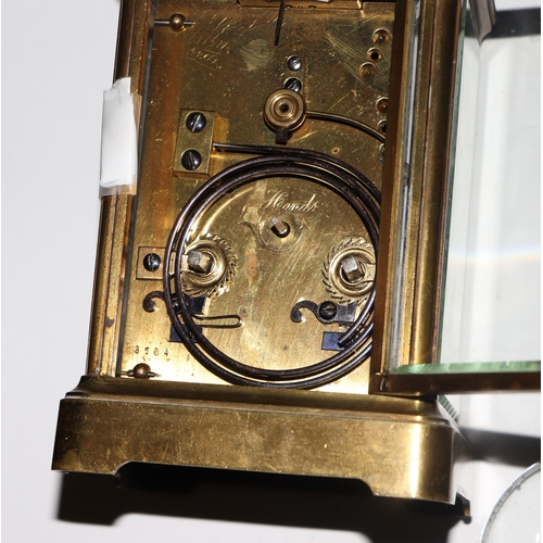 1692 - A French repeating carriage clock, the white enamel dial with Roman numerals, fitted an 8-day moveme... 