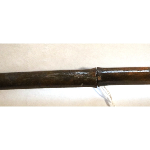 108 - A German pre 1947 bamboo sword stick, the pommel with a Nazi party enamel badge, 86cm long.