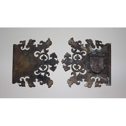 330 - A late 18th / early 19th century engraved brass lock plate with original key and associated hinges; ... 