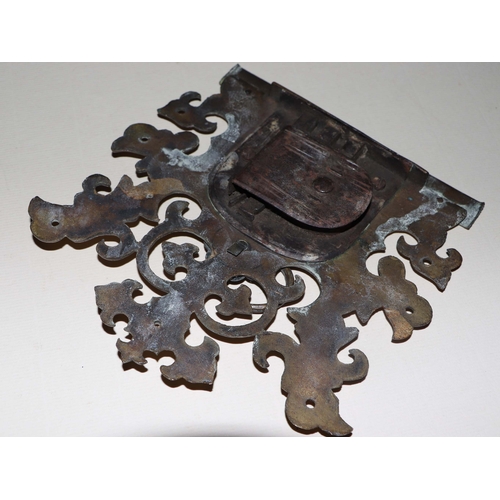 330 - A late 18th / early 19th century engraved brass lock plate with original key and associated hinges; ... 