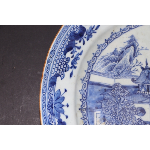 639 - A large 18th century Chinese blue & white oval meat plate decorated with a river landscape scene, 39... 