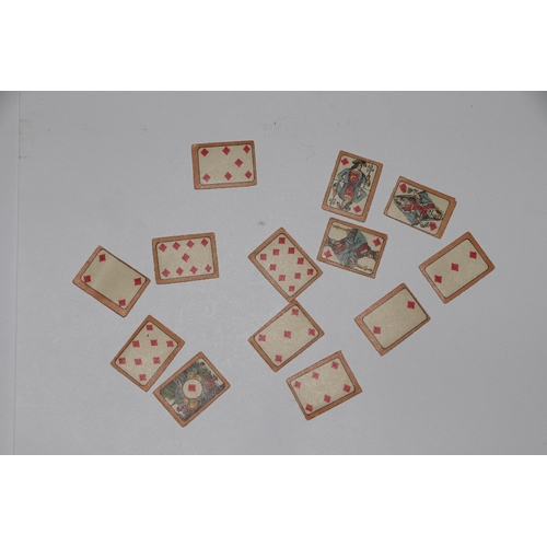 249 - Two set of antique miniature playing cards; together with a Bryce's miniature English dictionary in ... 