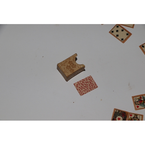 249 - Two set of antique miniature playing cards; together with a Bryce's miniature English dictionary in ... 