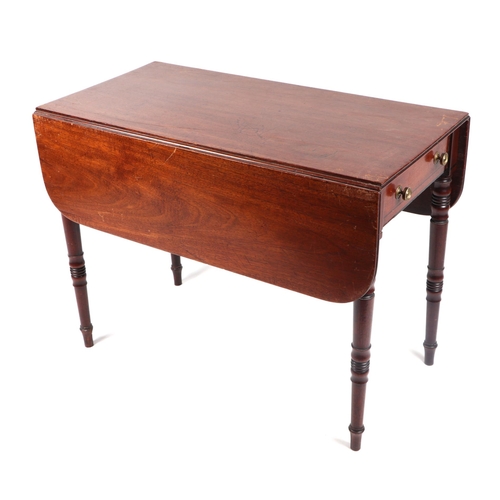 1013 - A 19th century mahogany Pembroke table on turned legs, 89cms wide.