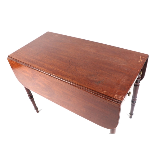 1013 - A 19th century mahogany Pembroke table on turned legs, 89cms wide.