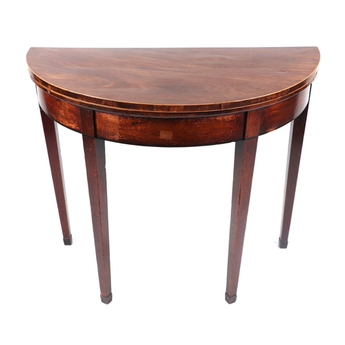 1014 - A 19th century demi-lune figured mahogany card table on square tapering legs, 92cms wide.