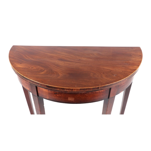 1014 - A 19th century demi-lune figured mahogany card table on square tapering legs, 92cms wide.