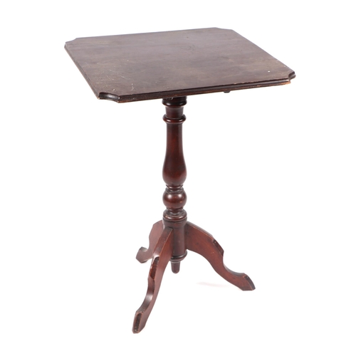 1022 - A mahogany occasional table on turned column and tripod base.