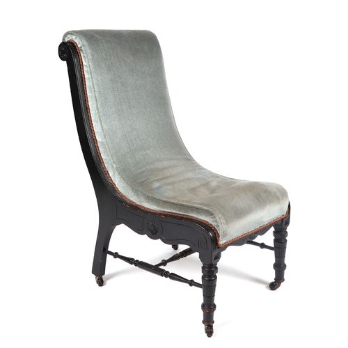 1037 - A Victorian ebonised slipper chair with upholstered seat.