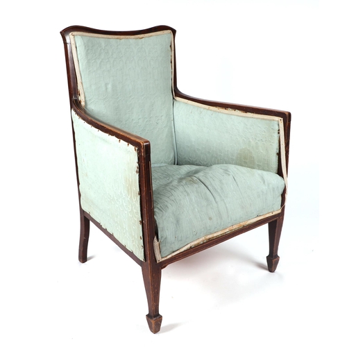 1040 - An Edwardian inlaid mahogany armchair.