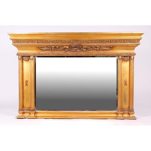 1045 - A Regency style giltwood and gesso overmantel mirror, 140cms wide.