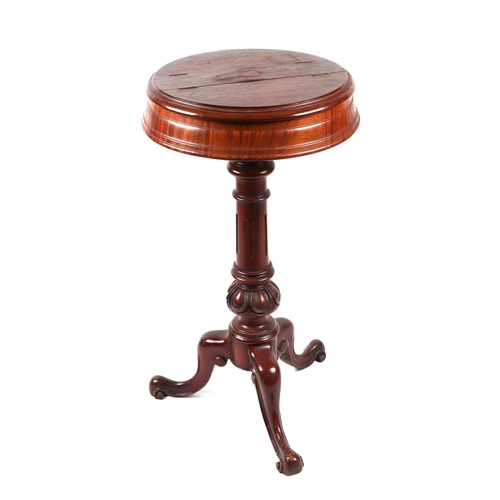 1071 - A Victorian stand, the circular top with two compartments with lift-up lids, on turned column and tr... 