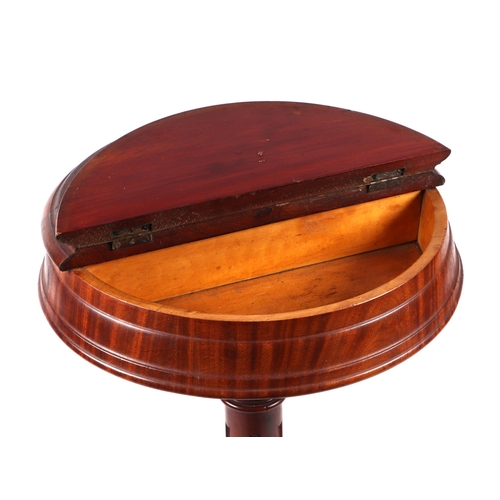 1071 - A Victorian stand, the circular top with two compartments with lift-up lids, on turned column and tr... 