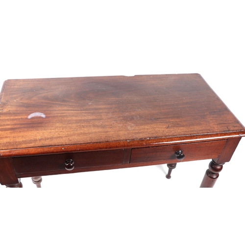 1076 - A Victorian mahogany side table with two frieze drawers, on turned legs,90cms wide.