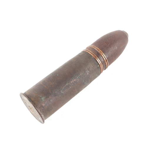 116 - A complete inert WWI artillery shell and brass casing. Date stamp to the base for 2. 16. (February 1... 