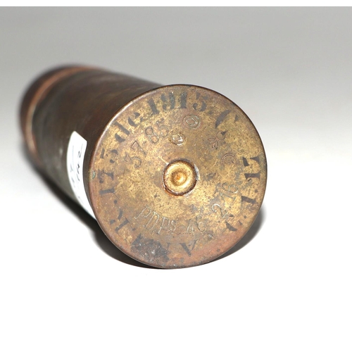 116 - A complete inert WWI artillery shell and brass casing. Date stamp to the base for 2. 16. (February 1... 