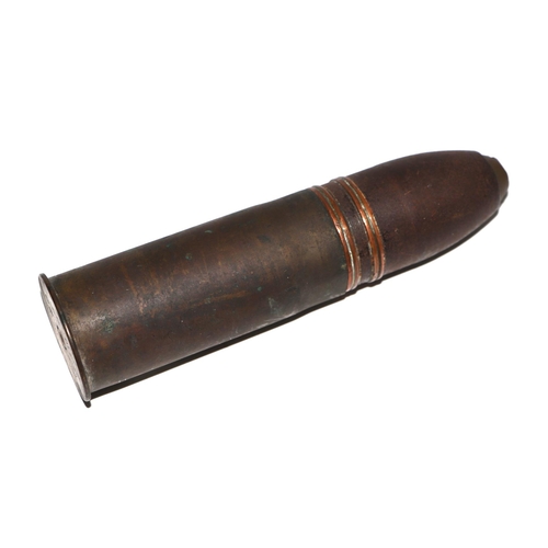 116 - A complete inert WWI artillery shell and brass casing. Date stamp to the base for 2. 16. (February 1... 