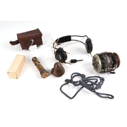 136 - A quantity of assorted militaria to include RAF headphones, 1950's RAF navigation instrument, Air Mi... 