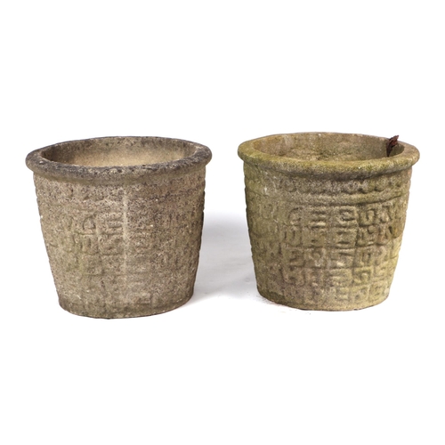 14 - A pair of well weathered reconstituted stone circular planters, 43cms diameter (2).