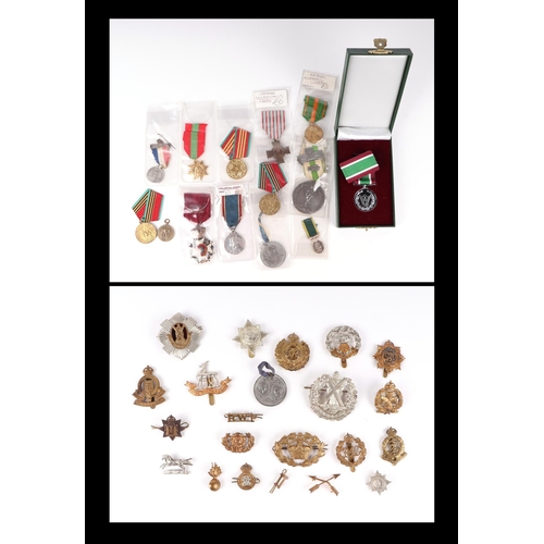 147 - A quantity of assorted militaria to include the Belgium Order of Leopold, France Combats Cross, Coro... 