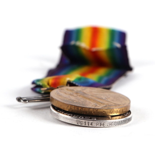 148 - A WWI  War & Victory pair of medals awarded to '26114.  PTE. H. GOODMAN. WILTS. R.'; together with a... 