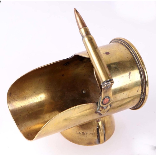 153 - A trench art miniature coal scuttle with bullet handle, 13cms long.