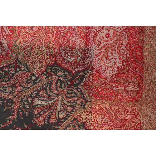 177 - Three Kashmir Paisley throws, the largest approx 314 by 147cms; together with a linen throw; a flora... 