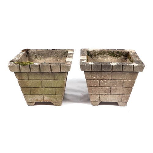 21 - A pair of well weathered reconstituted stone square planters, 38cms wide; together with two similar ... 