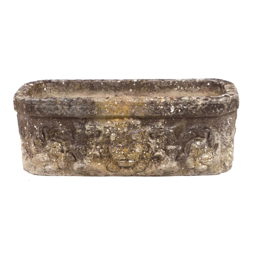 23 - A well weathered reconstituted stone trough, 72cms wide.