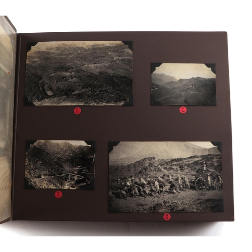 38 - An early 20th century photograph album covering various countries including Ceylon, Tibet, Afghanist... 