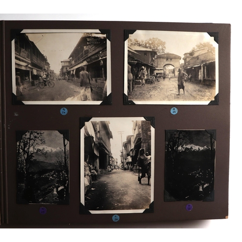 38 - An early 20th century photograph album covering various countries including Ceylon, Tibet, Afghanist... 