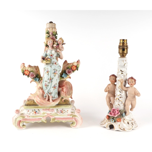 434 - A continental porcelain figural group table lamp, 34cms high; together with another similar, 23cms h... 