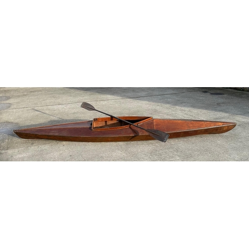 460 - A 1930's wooden single scull rowing boat, probably a Percy Blandford PBK14 kayak, 448cms (14ft 10ins... 