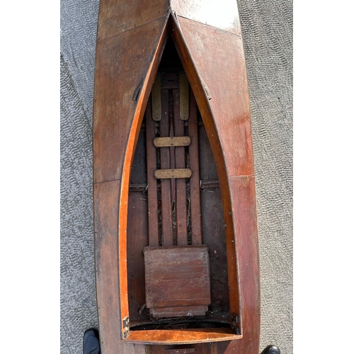 460 - A 1930's wooden single scull rowing boat, probably a Percy Blandford PBK14 kayak, 448cms (14ft 10ins... 