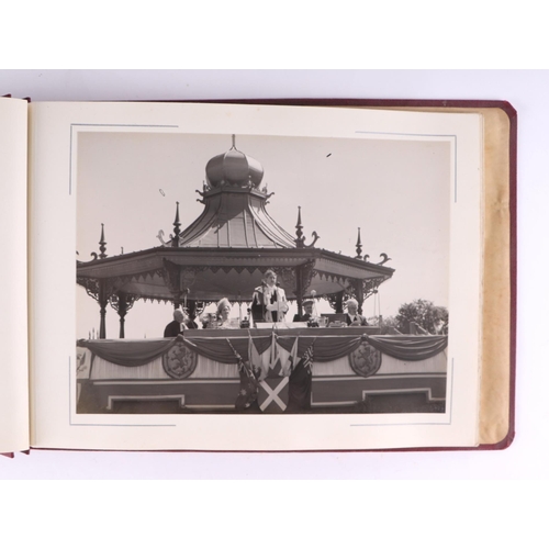 50 - A mid 20th century black & white photograph album depicting the Queen Mother on her Royal visit to A... 