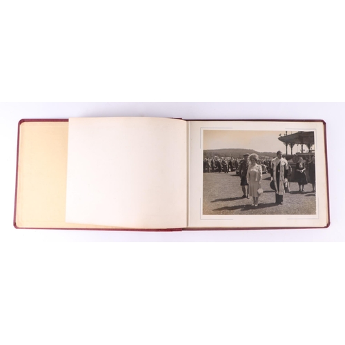 50 - A mid 20th century black & white photograph album depicting the Queen Mother on her Royal visit to A... 