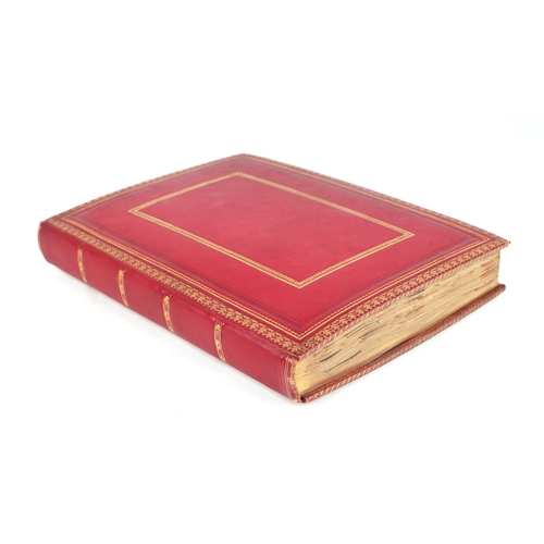 51 - A Victorian red leather scrap album.