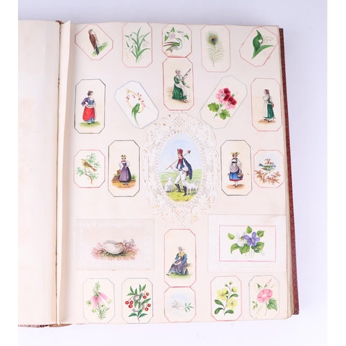 51 - A Victorian red leather scrap album.