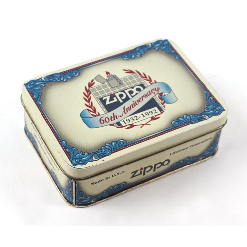 564 - A Zippo 60th Anniversary (1932-1992) petrol cigarette lighter, cased and unused.