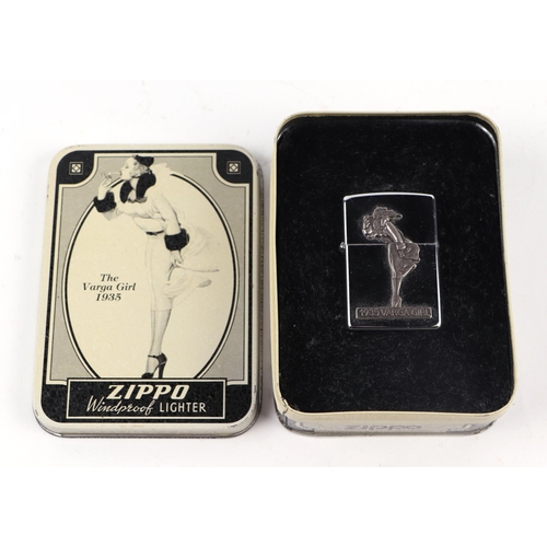 569 - A Zippo Varga Girl (1935) petrol cigarette lighter, cased and unused.