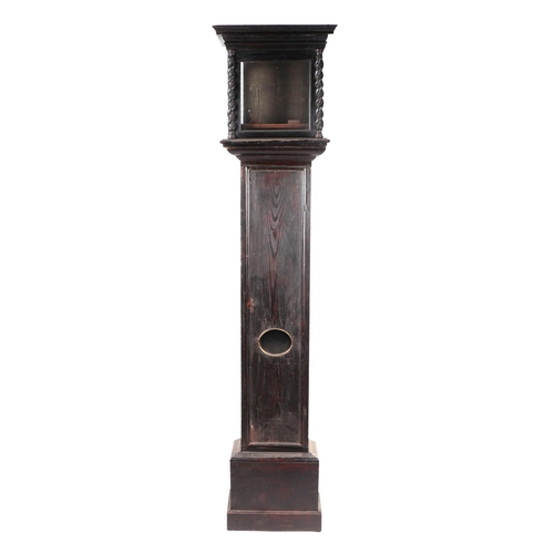 597 - An oak longcase clock case with lenticle trunk door, 195cms high.