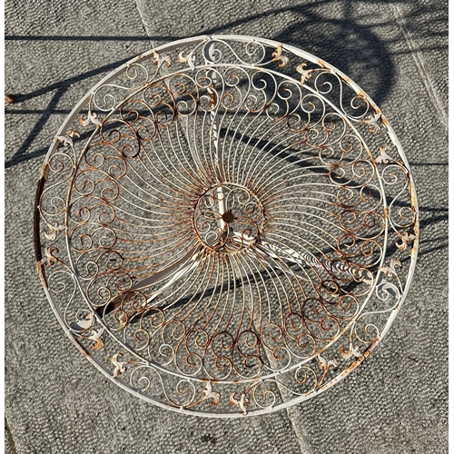 6 - A distressed painted metal garden patio set comprising circular table and two folding chairs (3).