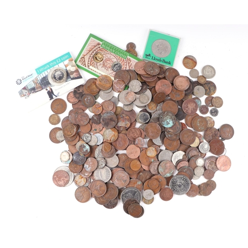 636 - A Change Checker album containing twenty four £1 coins, sixty eight 50p coins and thirty £2 coins; t... 