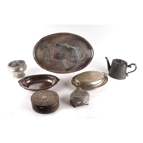 643 - A quantity of assorted silver plated items to include a candlestick, cream jugs, footed bowl, goblet... 