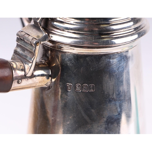 646 - A late Victorian Georgian style Britannia Standard silver coffee pot with side treen handle, foliate... 