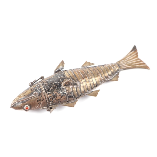 671 - A white metal (tests as silver) Jewish articulated fish Besamim spice box, 13cm long, 49g.