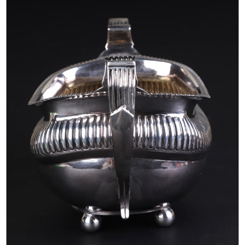 683 - A George III silver sugar bowl, London 1813, 21cms wide, 287g.