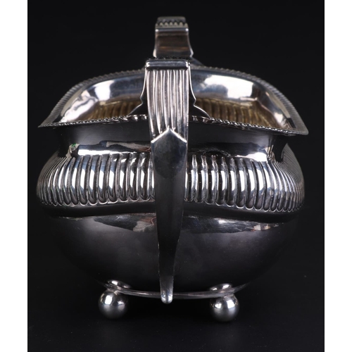 683 - A George III silver sugar bowl, London 1813, 21cms wide, 287g.